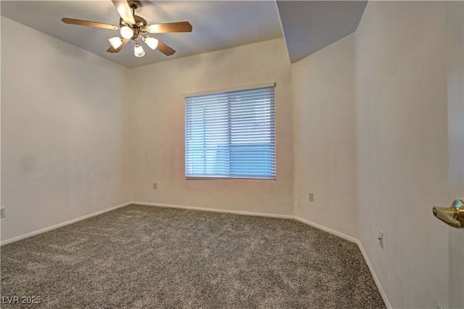 Spare room with carpet, baseboards, and a ceiling fan | Image 15