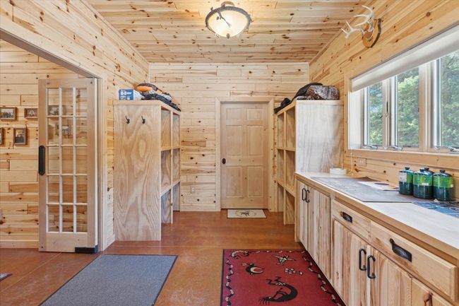 Sportsman storage and walk-in closet | Image 48
