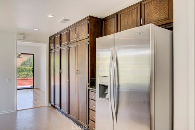 Another view of the kitchen looking towards the dining room. | Image 15