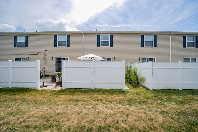 Rear view of property with a lawn | Image 27