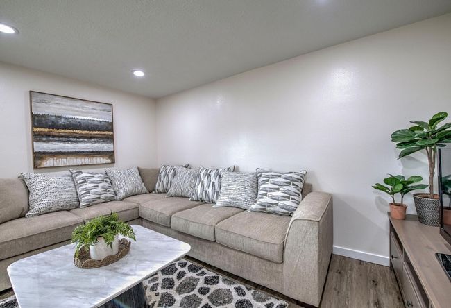 Living room featuring baseboards, recessed lighting, and wood finished floors | Image 7