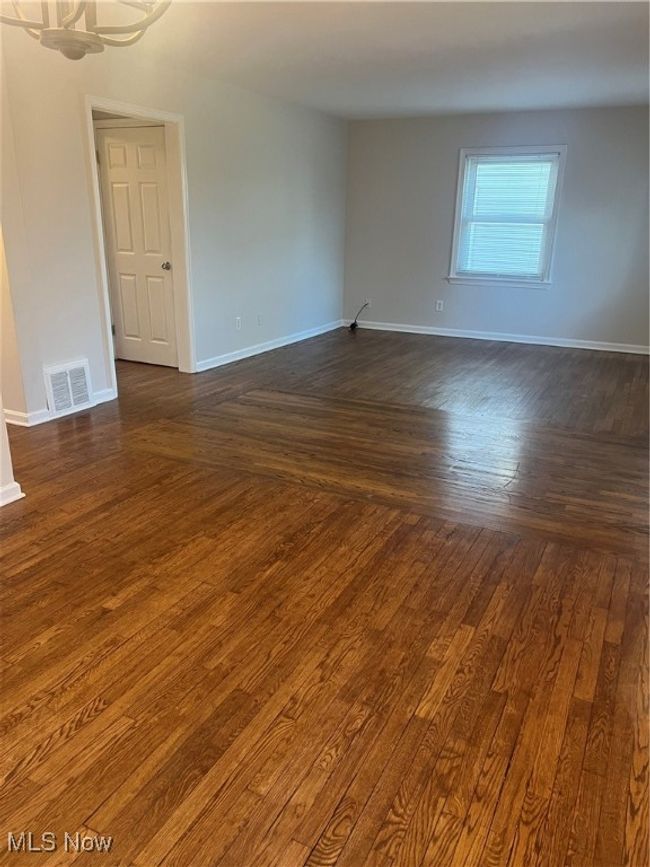 Livingroom featuring dark hardwood / wood-style flooring | Image 6