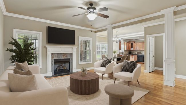 The open eat-in kitchen flows nicely to the informal or formal dining area, out to the covered deck, or into the living room. | Image 7