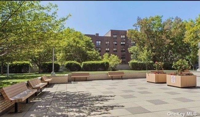 View of property's community featuring outdoor lounge area and a patio area | Image 14