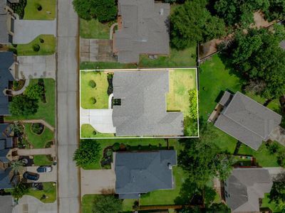 Amazing aerial shot of this gorgeous Sitterle home situated on a large lot on a quiet cul-de-sac street in the sought after community of Stewarts Forest. Lush landscaping, well manicured front lawn and a wonderful back patio perfect to set up, an outdoor sitting area. | Image 3