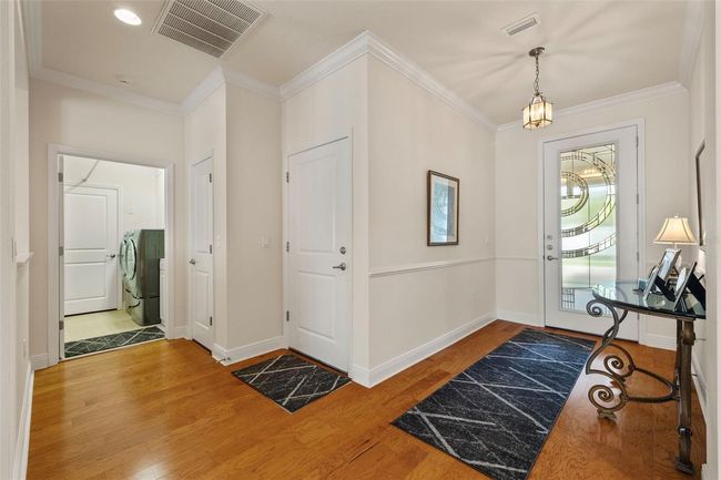 Foyer and hallway to laundry room | Image 9