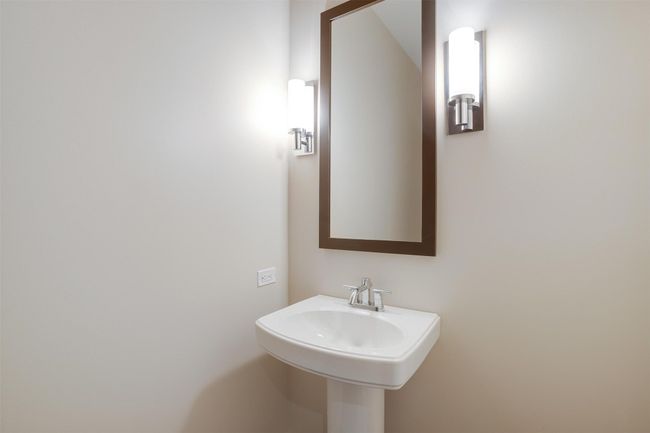 Bathroom featuring a sink | Image 8