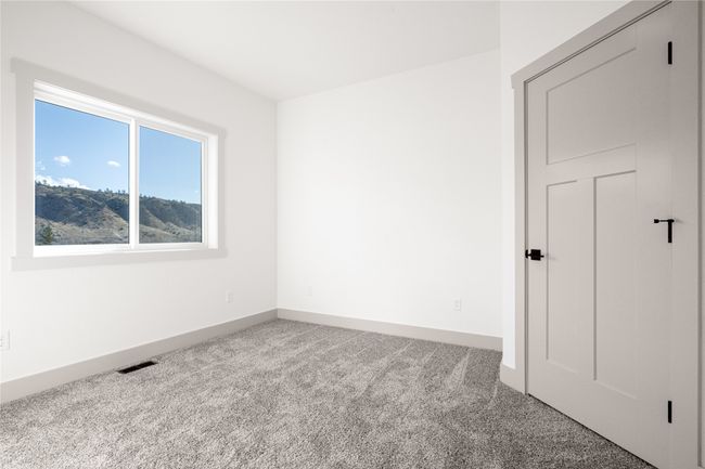 Unfurnished room with carpet floors and baseboards | Image 24