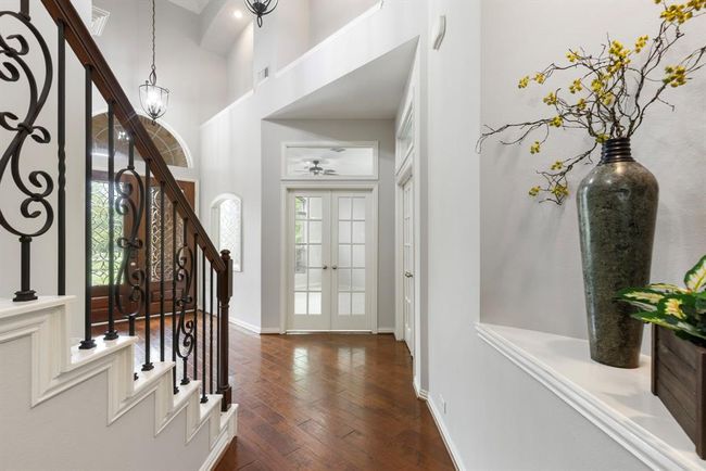 Soaring ceilings in entry areas and family room. | Image 8