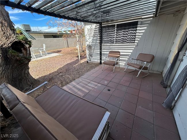 Fenced backyard featuring a patio and a pergola | Image 26