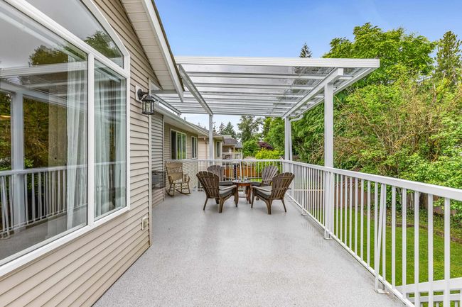 View of patio / terrace featuring a pergola | Image 26