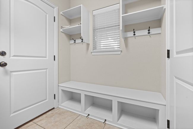 Mudroom with light tile patterned floors | Image 27