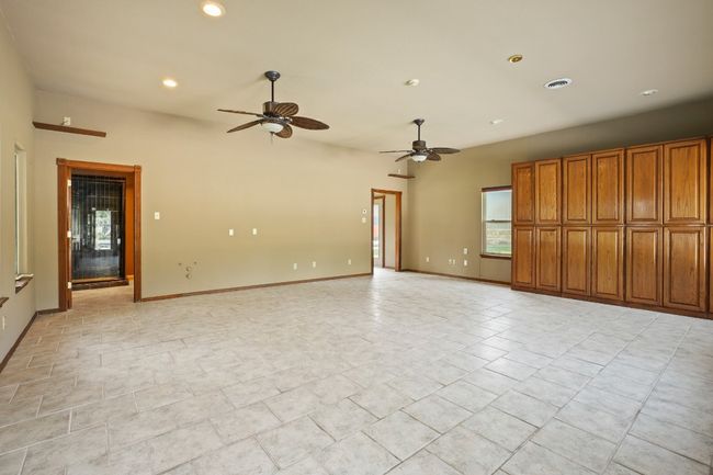 Pool house with tons of storage. It's also plumbed for a kitchen sink. | Image 28
