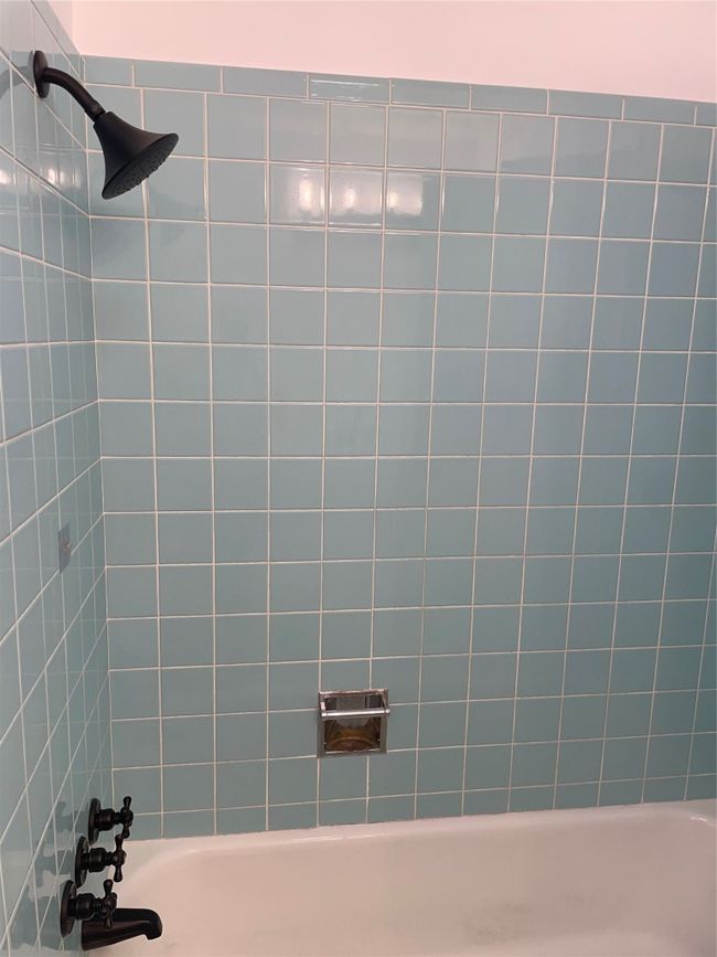 Bathroom featuring bathtub / shower combination | Image 15