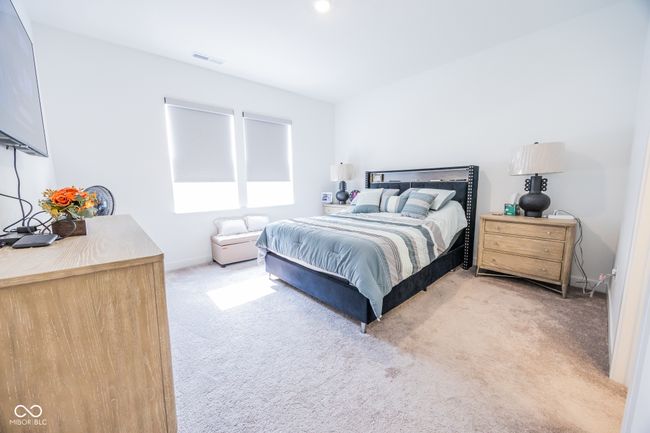 bedroom featuring carpet and baseboards | Image 12