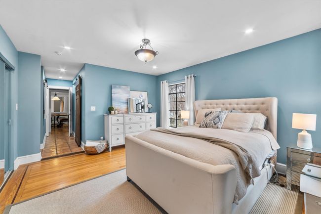 Primary Bedroom featuring recessed lighting and wood finished floors | Image 25