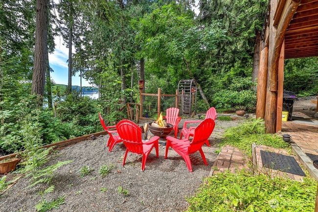 Ground level firepit with a view perfect for story telling and s'mores! | Image 22