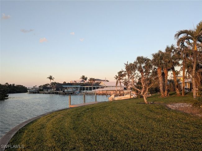 View of water feature featuring a boat dock | Image 8
