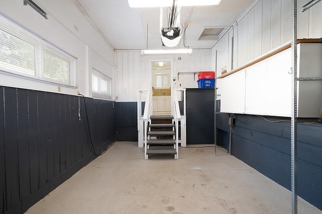 Garage featuring a garage door opener | Image 25