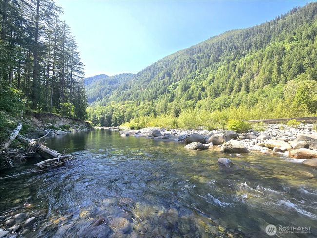 Private community beach / swimming hole. Just a 2 minute walk from your front door. | Image 23