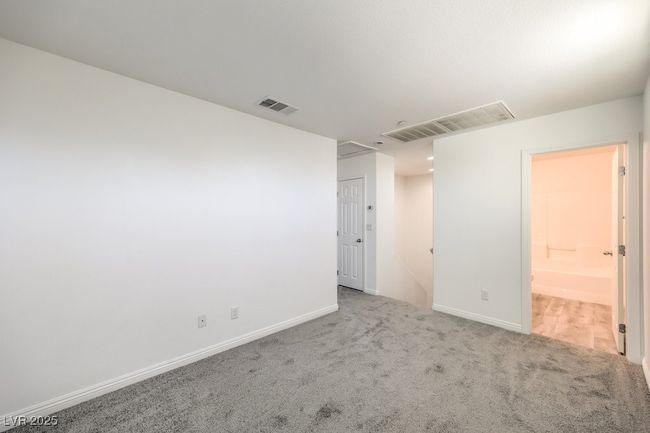 Empty room featuring carpet floors, baseboards, and visible vents | Image 28