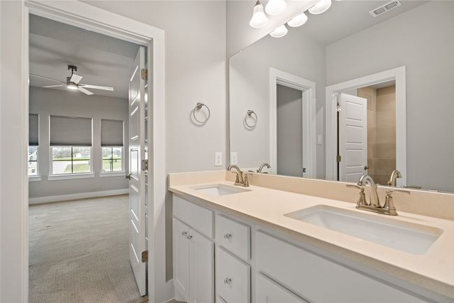 Shared Bathroom upstairs and there is also another full bathroom. | Image 34