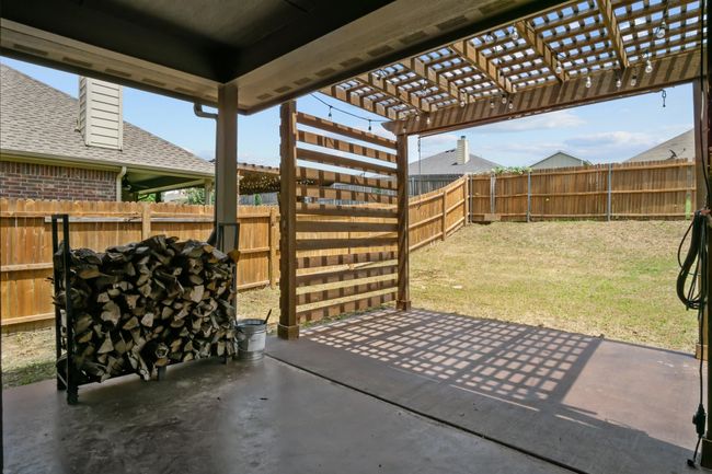 View of patio / terrace with a fenced backyard and a pergola | Image 4