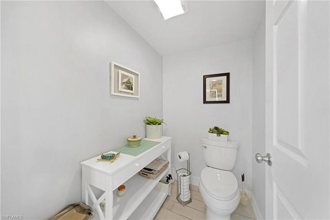 Bathroom featuring tile patterned flooring and toilet | Image 27