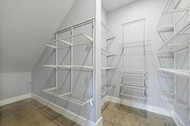 The oversized walk-in pantry comes with adjustible shelving to help keep you well organized. | Image 18