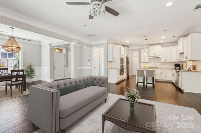 Virtually staged - family room, dining, and kitchen | Image 8