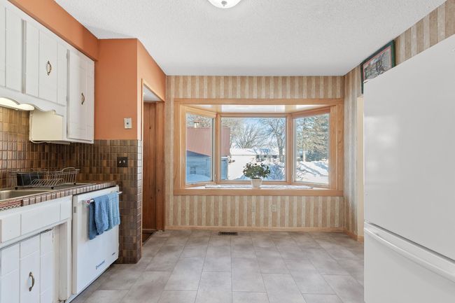 11212 W River Road, House other with 4 bedrooms, 3 bathrooms and null parking in Champlin MN | Image 22
