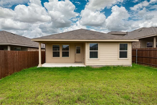 Rear view of house featuring a patio | Image 35