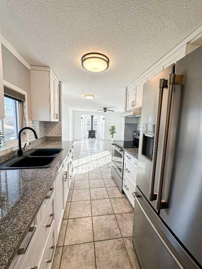 25 Southridge Crescent, Home with 2 bedrooms, 2 bathrooms and 2 parking in Didsbury AB | Image 9