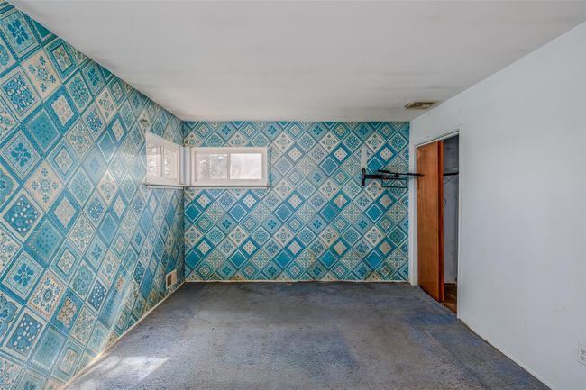 Empty room with carpet floors and visible vents | Image 15