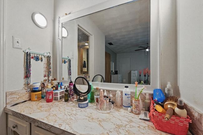 Bathroom featuring ceiling fan | Image 22