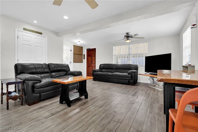 Living room featuring recessed lighting, ceiling, floors, and ceiling fan | Image 12