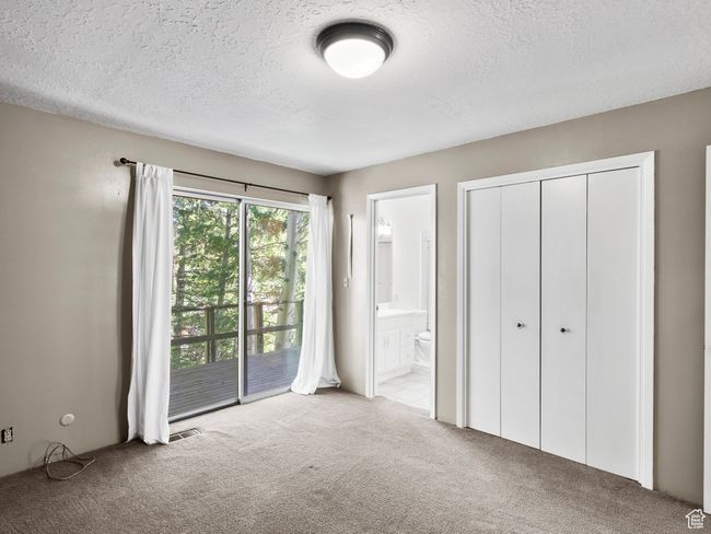 Unfurnished bedroom with access to exterior deck | Image 8