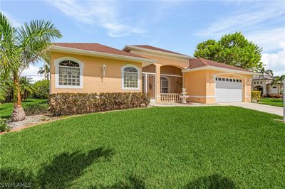 1401 Sw 52nd Lane, House other with 3 bedrooms, 2 bathrooms and null parking in Cape Coral FL | Image 2