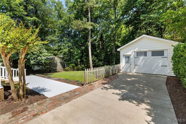 Detached one-car garage with pedestrian door. | Image 40