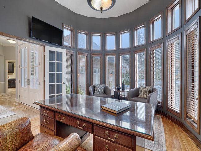 The impressive main floor office is a great work from home space! | Image 15