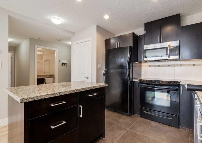2105 - 77 Spruce Pl Sw, Condo with 2 bedrooms, 2 bathrooms and 1 parking in Calgary AB | Image 5