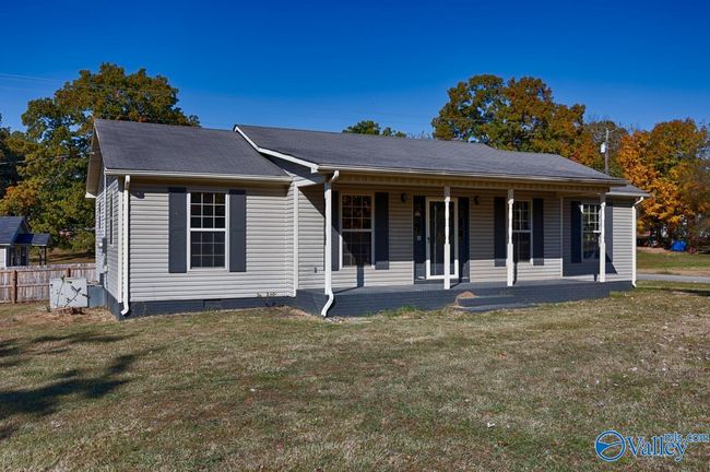 Covered front porch, vinyl siding, gutters | Image 4
