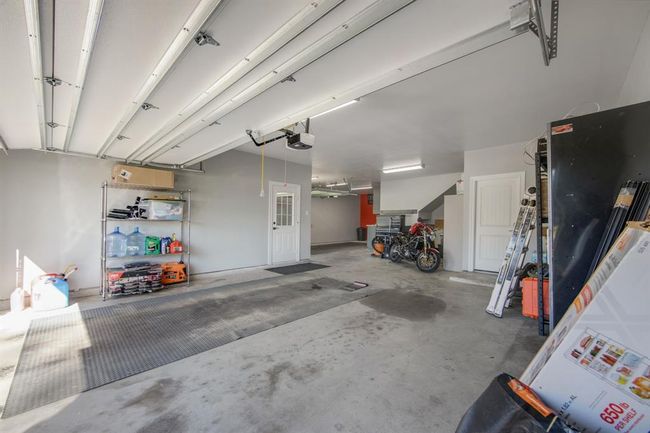 Sellers recently painted the garage walls & ceiling. Replaced the double and single garage doors with insulated doors, replaced garage door openers, springs with wind bracing | Image 33