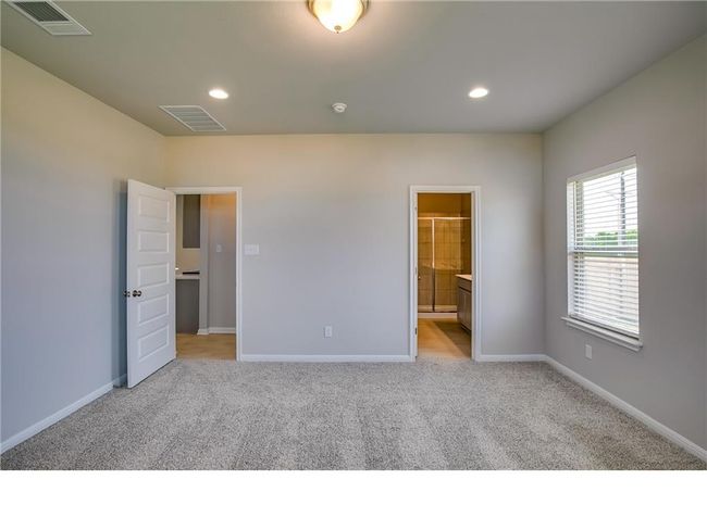 Unfurnished bedroom featuring light carpet and recessed lighting | Image 13