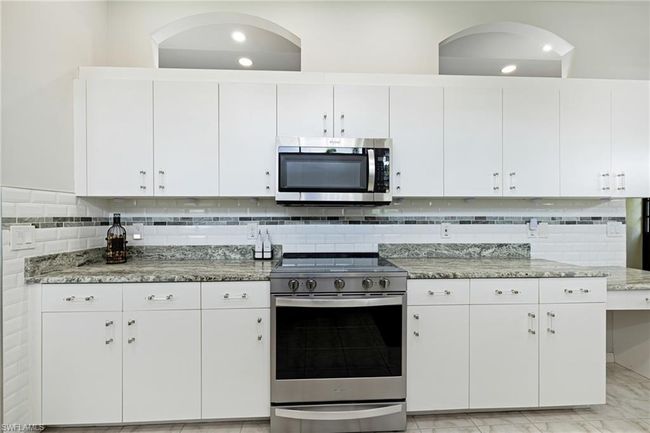 12802 Maiden Cane Ln, Condo with 3 bedrooms, 2 bathrooms and 2 parking in BONITA SPRINGS FL | Image 8
