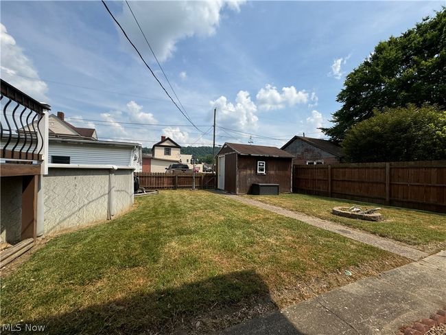View of yard with a shed | Image 27