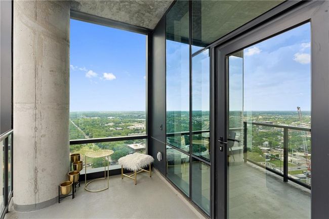 Unfurnished sunroom with a wealth of natural light | Image 24