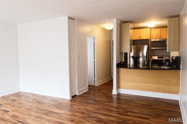 A look at the living and kitchen areas. | Image 5