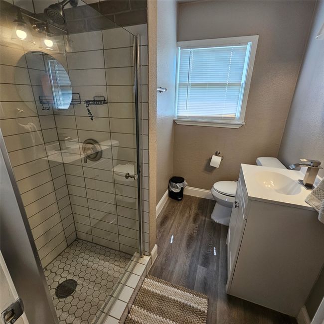 Bathroom featuring, standing shower. | Image 21