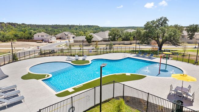 Community pool featuring fence, a residential view, and a patio area | Image 38